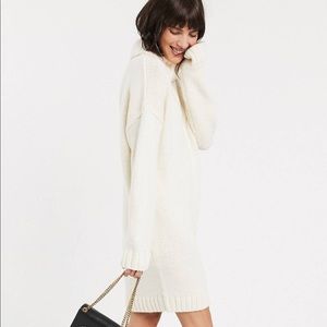 Chunky mini dress with roll neck & open back